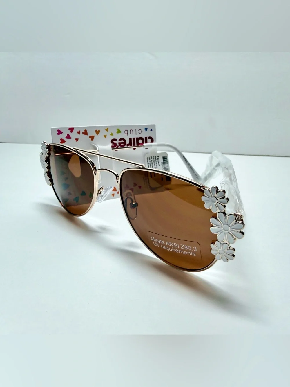 Claire's Brown Lens Sunglasses with White Floral Accents